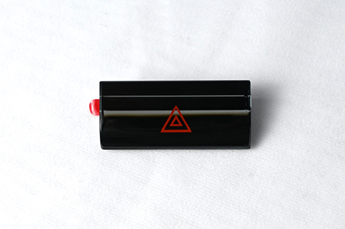 Automotive button made of black crystal glass for car interiors